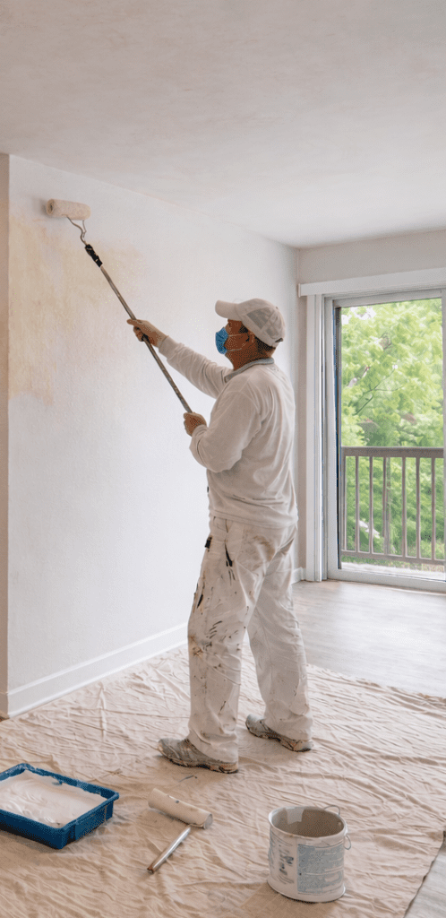image of a painter prepping a rental for new tenants