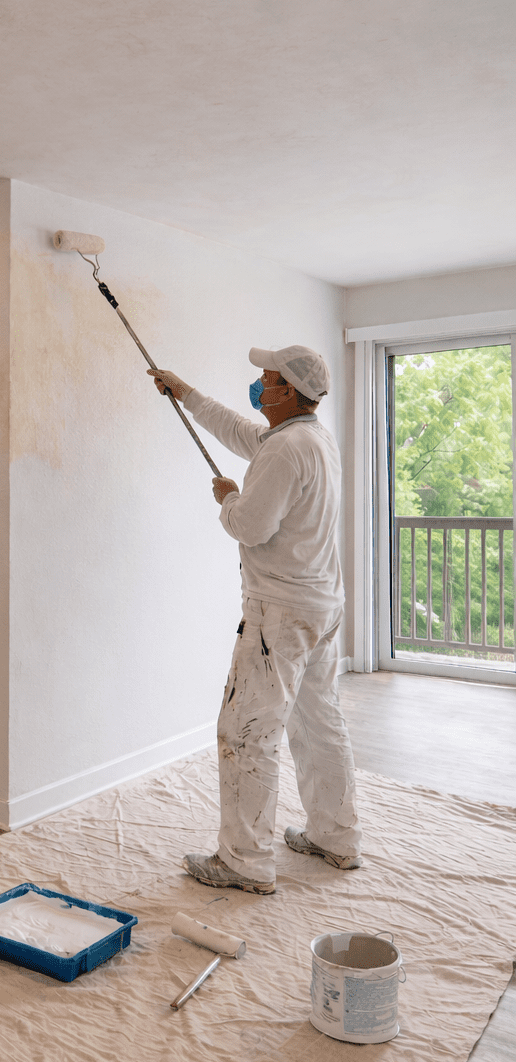 image of a painter prepping a rental for new tenants